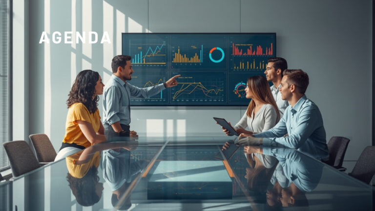 Diverse business team reviewing an analytics dashboard together in a bright office